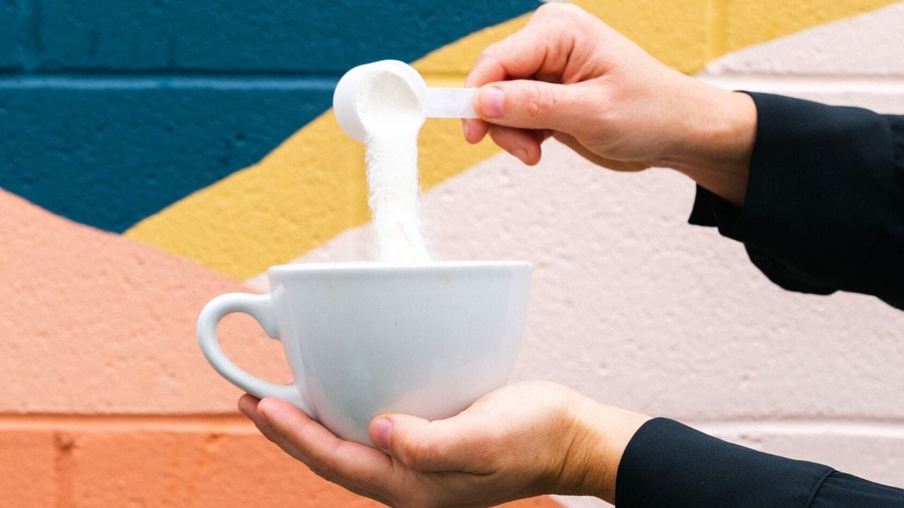Collagen Powder being poured into a cup